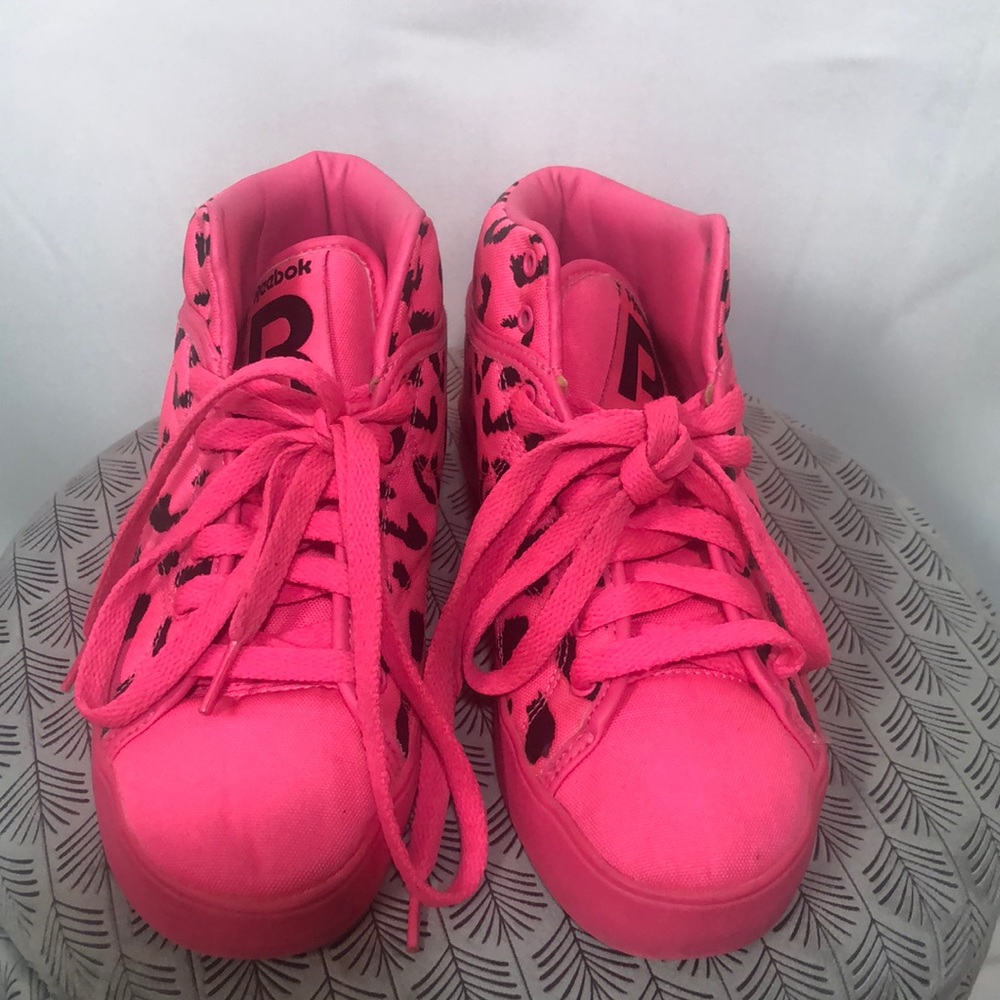 Reebok hot pink and black cheetah mid tops